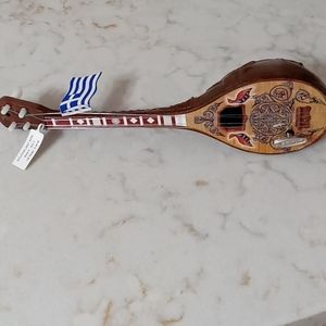 Handmade wind up musical guitar made in Greece